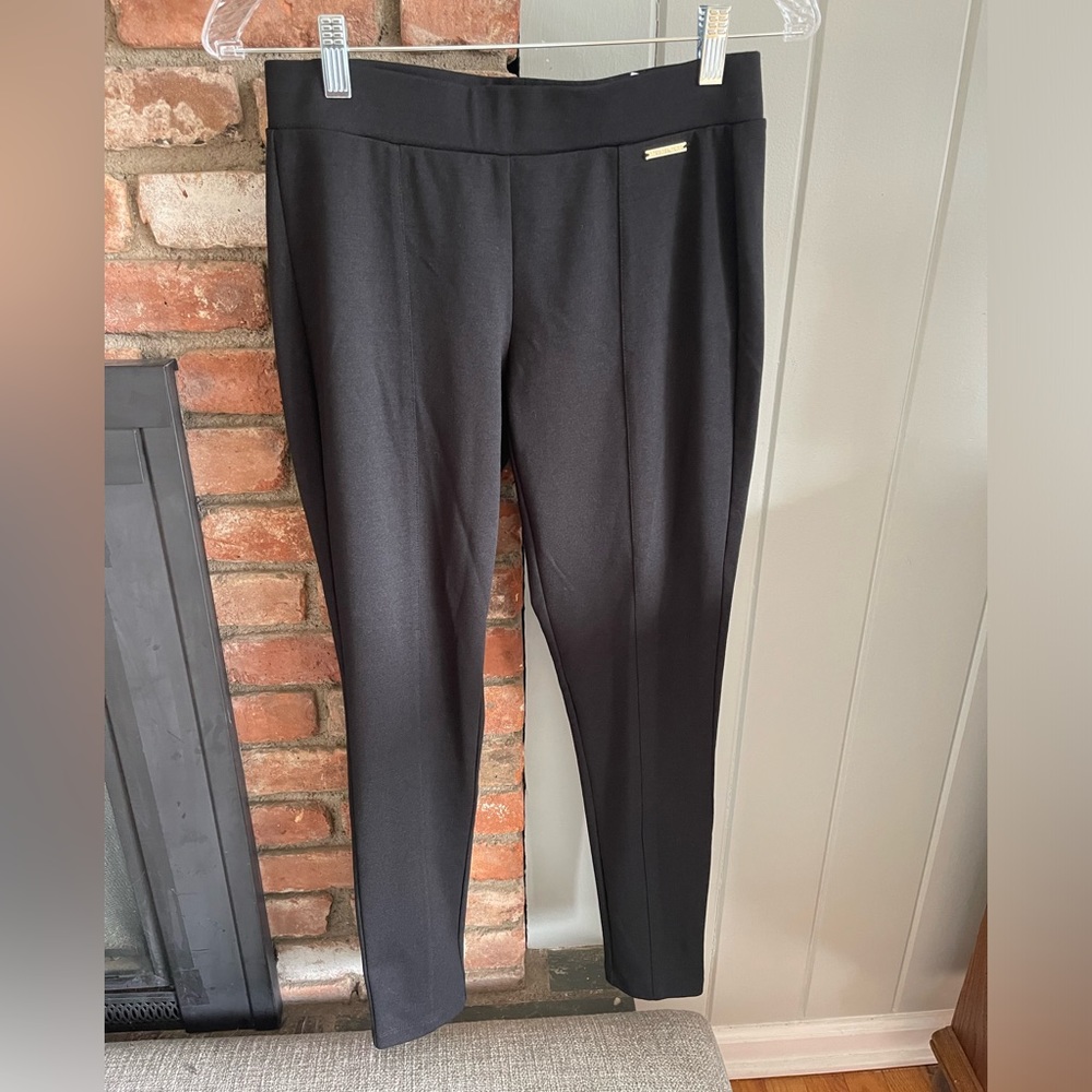 Michael Kors mid rise pull on black pants. Women’s size small.